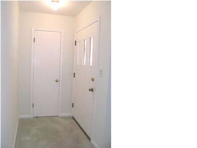 The entry foyer includes a nice coat closet.