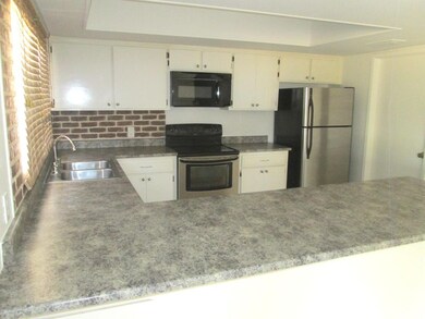 Kitchen w/large bar seating counter