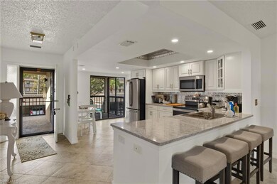 1782 Imperial Golf Course Blvd unit C-203, Naples, FL 34110 - photo 4