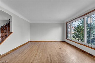 Spare room with light wood-type flooring