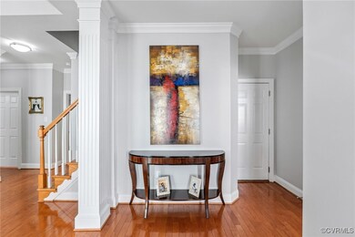 Details featuring baseboards, ornamental molding,