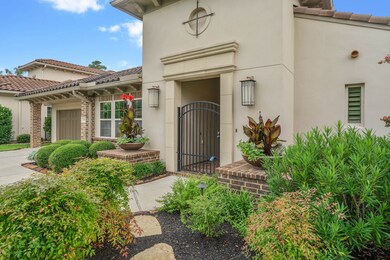 Charming gated courtyard entry welcomes you home w