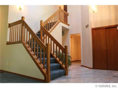 Foyer. Open stairway to the second floor.