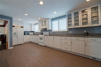 Beautiful updated kitchen featuring granite counte