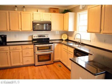 Exterior Front. Kitchen with granite countertops