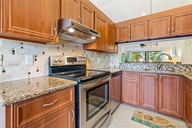 Kitchen with quartz countertops and stainless stee