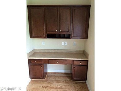 Exterior Front. Built in Desk