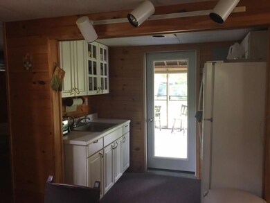 Includes a kitchen off of the screen...