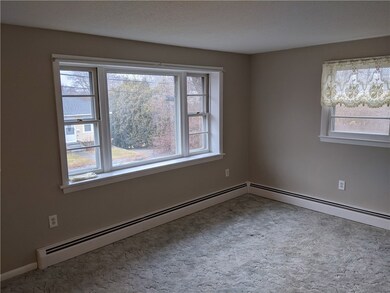 Walk to all the events in downtown Westerly from a convenient rental Ranch at 32 Spring Street just off of Cross Street. The living room opens up to the kitchen and dining room while down the hall are the three bedrooms with nice hardwood floors and a bathroom.  Next to the kitchen is a three season porch with both windows and screens.  The attached garage is part of the unfinished basement. The backyard is perfect for grilling and badminton!  Check it out!