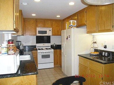 Lots of cabinets in kitchen