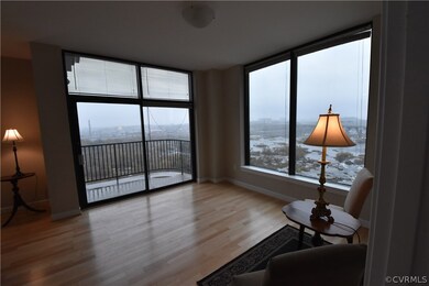 2 walls of windows overlooking the James River rap