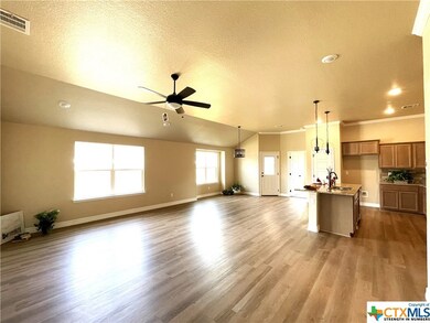 Up-to-date open floorplan features a voluminous li