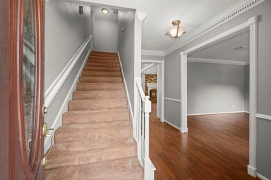 Entry with Dining room to the left, formal living or office to the right.