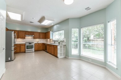 The spacious kitchen is connected to the breakfast