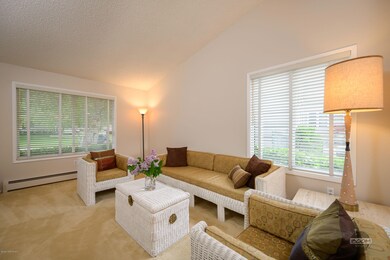 Formal livingroom with tons of windows.