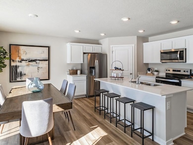 Open dining area.  Model home shown.
