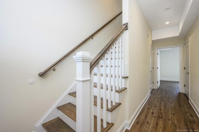 The garage connects to the entry level.