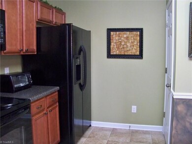 Kitchen wraps around to the refrigerator area and a large pantry!