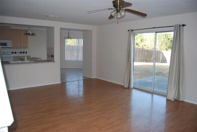 Unfurnished living room with baseboards, visible 