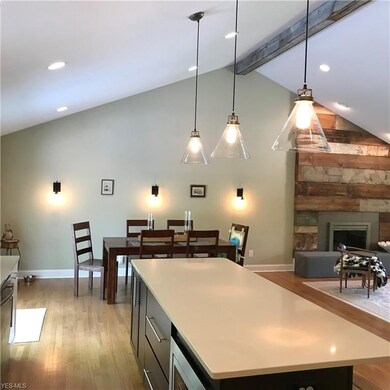 Bright kitchen with lots of natural light as well 