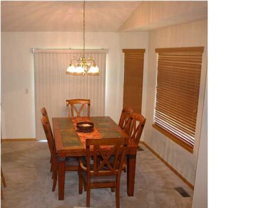 DINING ROOM WITH BAY WINDOW WHICH ALSO HAS CUSTOM 
