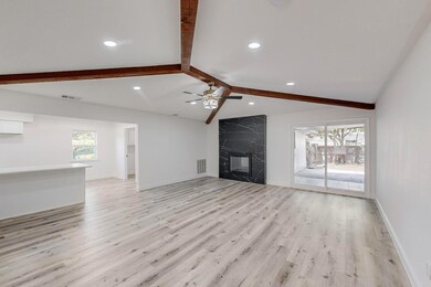 Unfurnished living room with a healthy amount of s