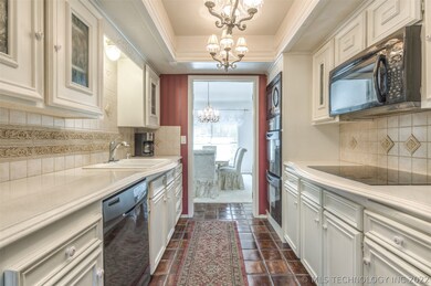 Updated Kitchen with Quartz Countertops & Tile Bac