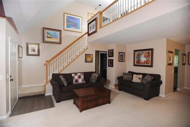 High ceilings add a sense of spaciousness to the living room.