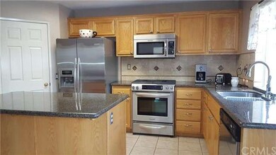 Kitchen with KitchenAid, stainless steel appliance