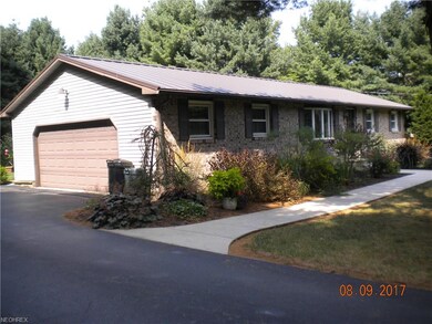 2 Car attached garage with blacktop drive and pave