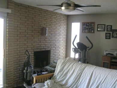 Family room with wood burning fireplace