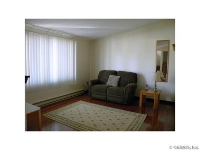 Living Room. 11x13 Lving room with hardwood floor 