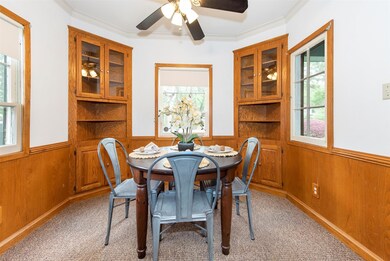 Charming casual dining space at the front end of t