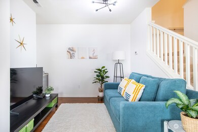 Formal dining area is currently used as movie nook. Could also be a great home office.