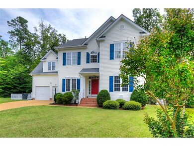 The home has an aggregate driveway and low mainten