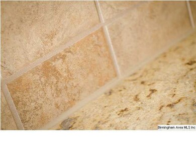 Custom Tile with Granite Countertops