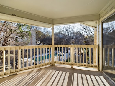 Wooden terrace featuring an outdoor pool