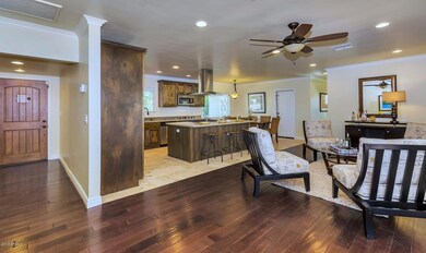7002 N 13th St-large-004-3-Family RoomKi