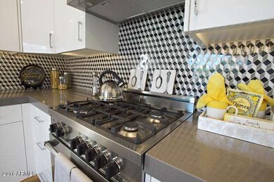 Kitchen with Bertazoni gas range