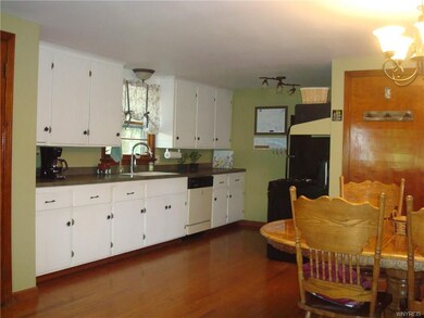 Kitchen features updated counter top, sink and fau