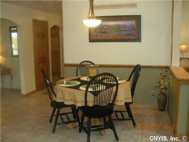 Dining Room Dining area @ end of kitchen with fami