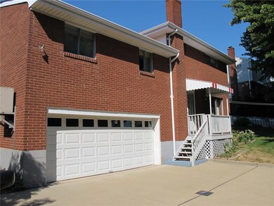 Two car garage and concrete driveway