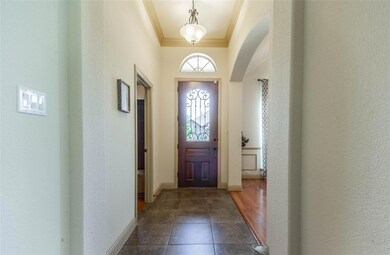 Tiled entryway with ornamental molding