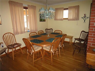 DINING ROOM OPENS TO KITCHEN AND LIVING ROOM