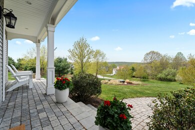 Framed with extensive hardscape, professional landscape and irrigation
