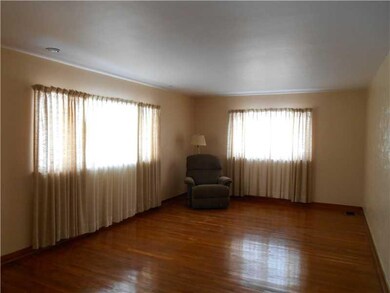 Living Room. Spacious living room with hardwood fl