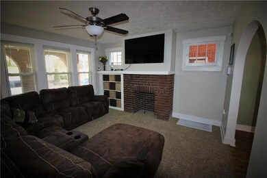 Large windows flood the room with natural light.