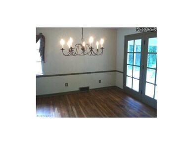 The freshly painted Dining Room also has hardwood 