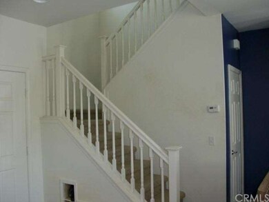 Stairway leads to 3 bedrooms and 2 baths