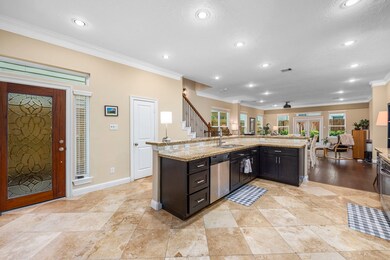 The front door leads you into the kitchen. A half